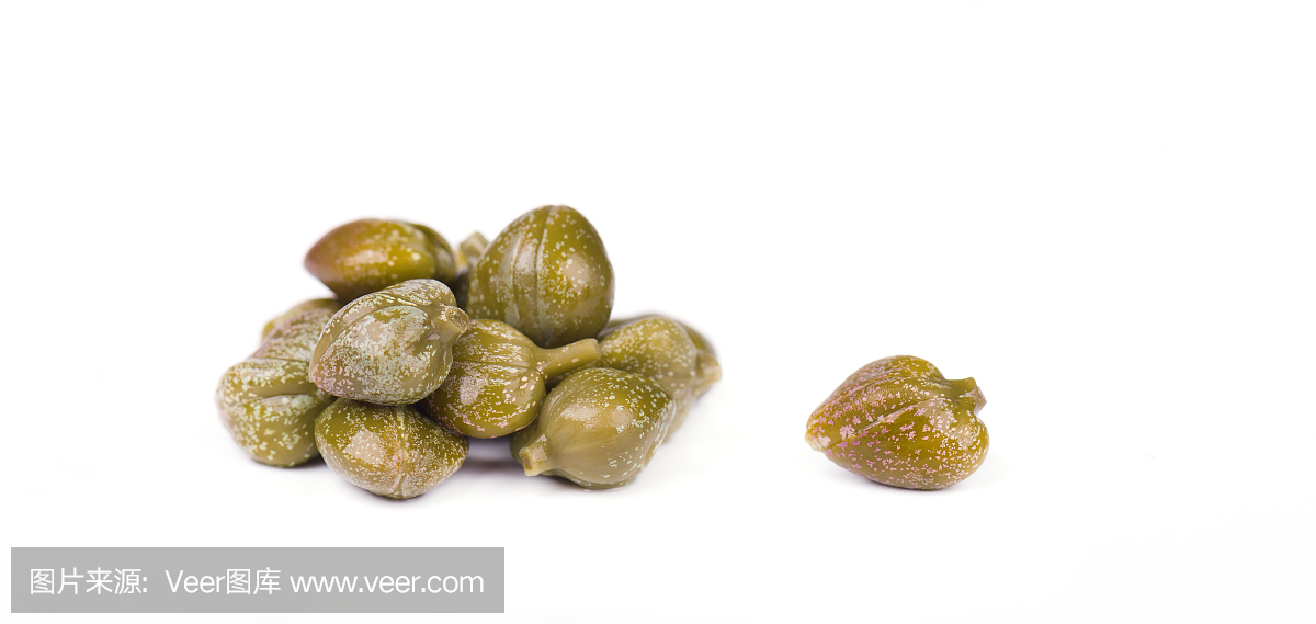 Marinated capers isolated on white background