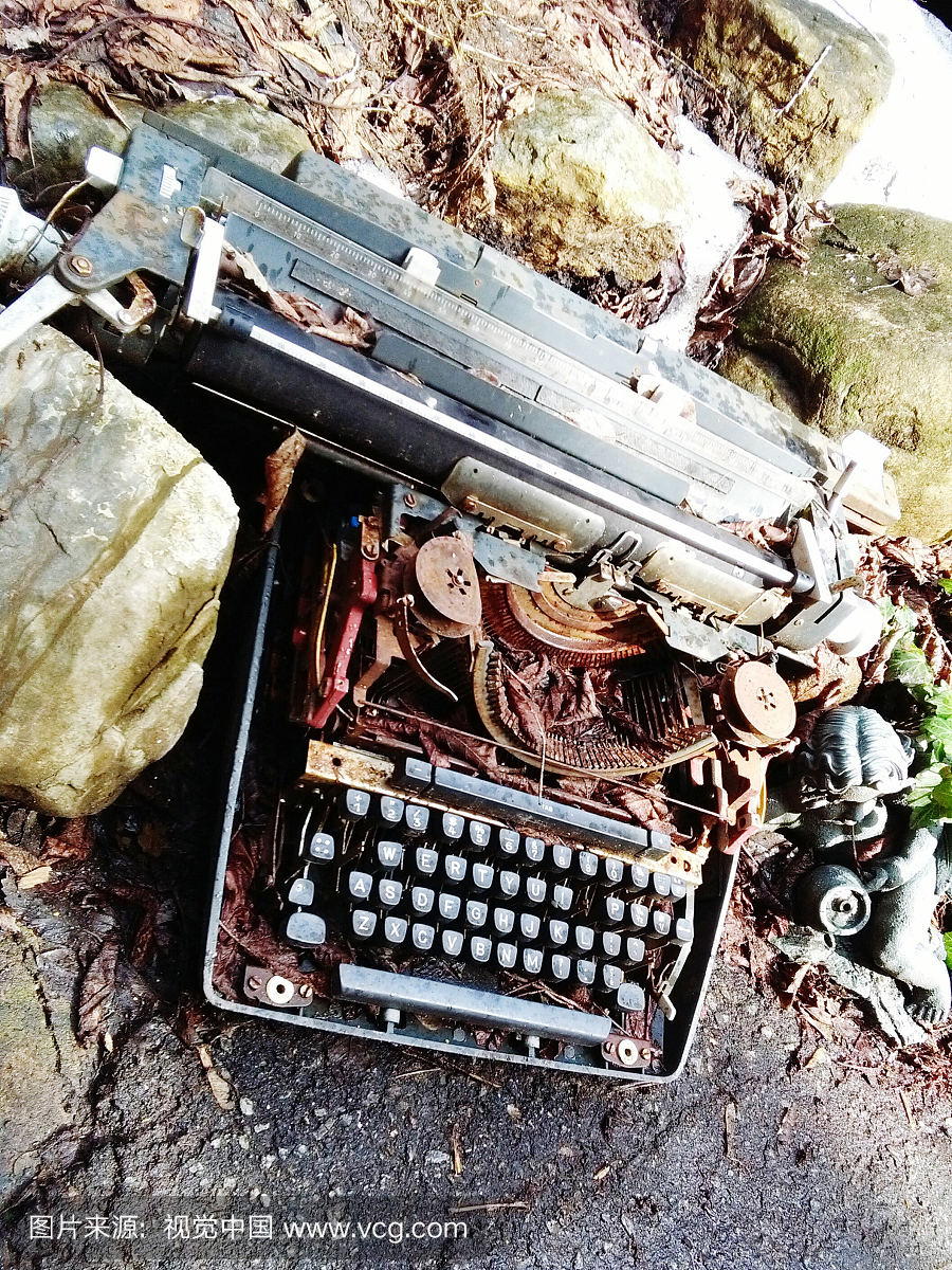 High Angle View Of Old Damaged Typewriter O