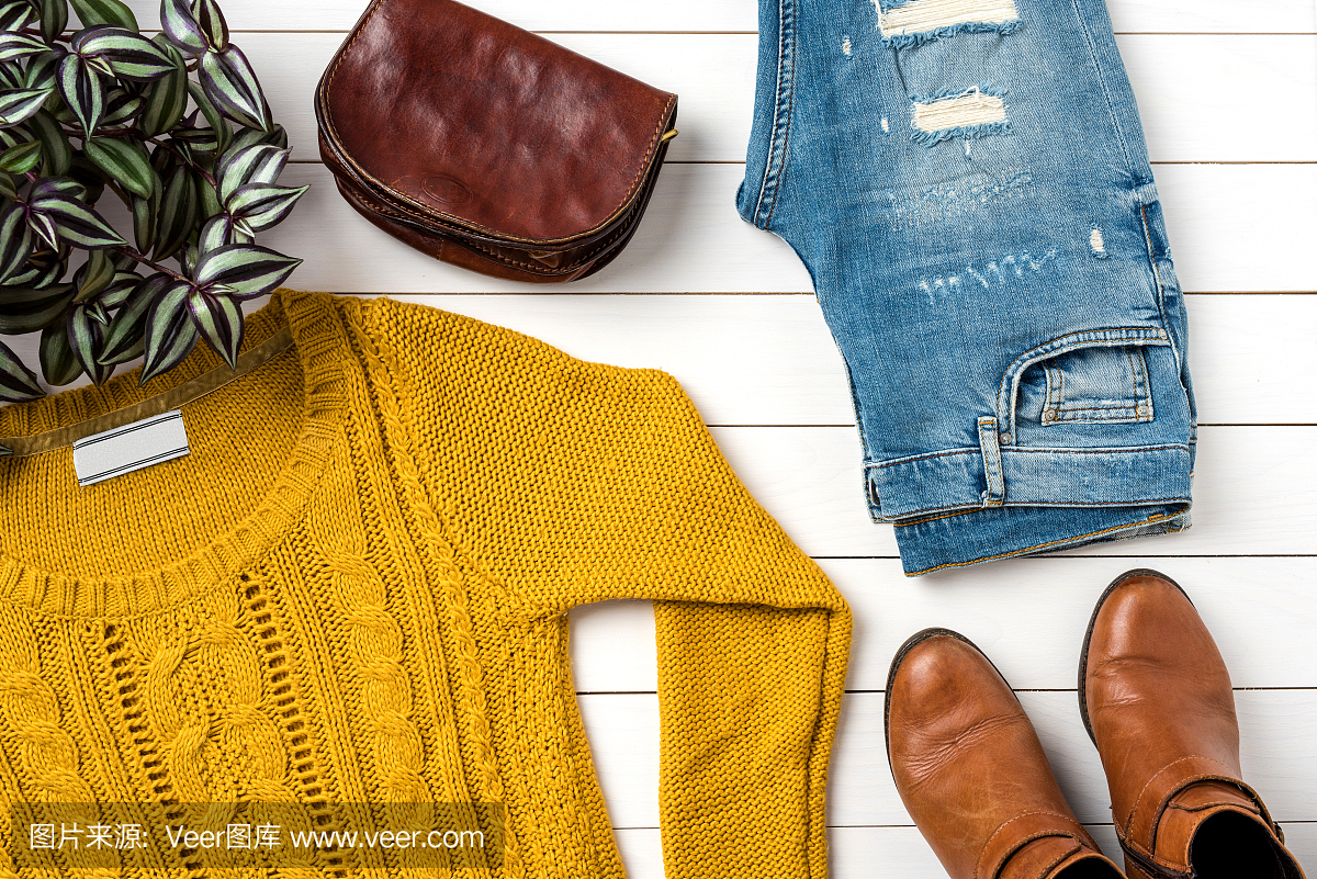 女人冬季保暖衣物。时尚背景