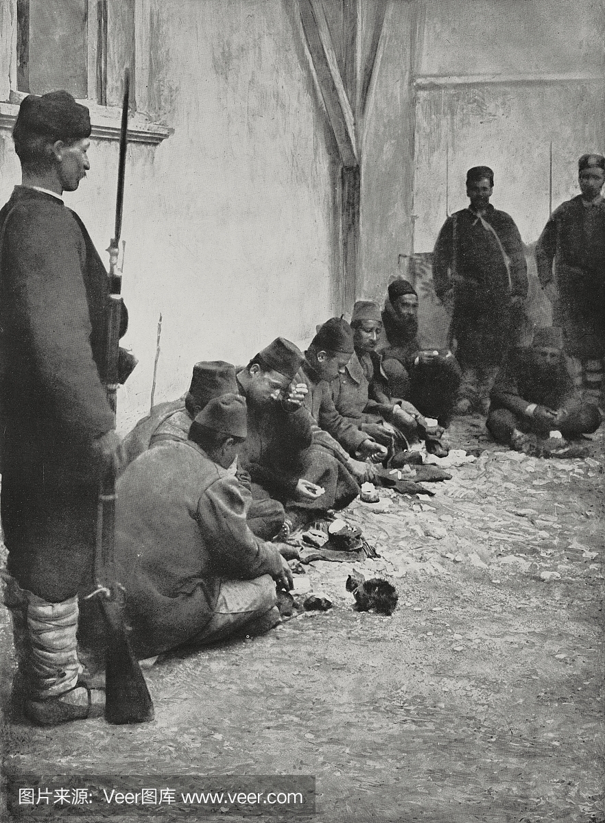 来自第一次巴尔干战争的一些土耳其囚犯坐在地