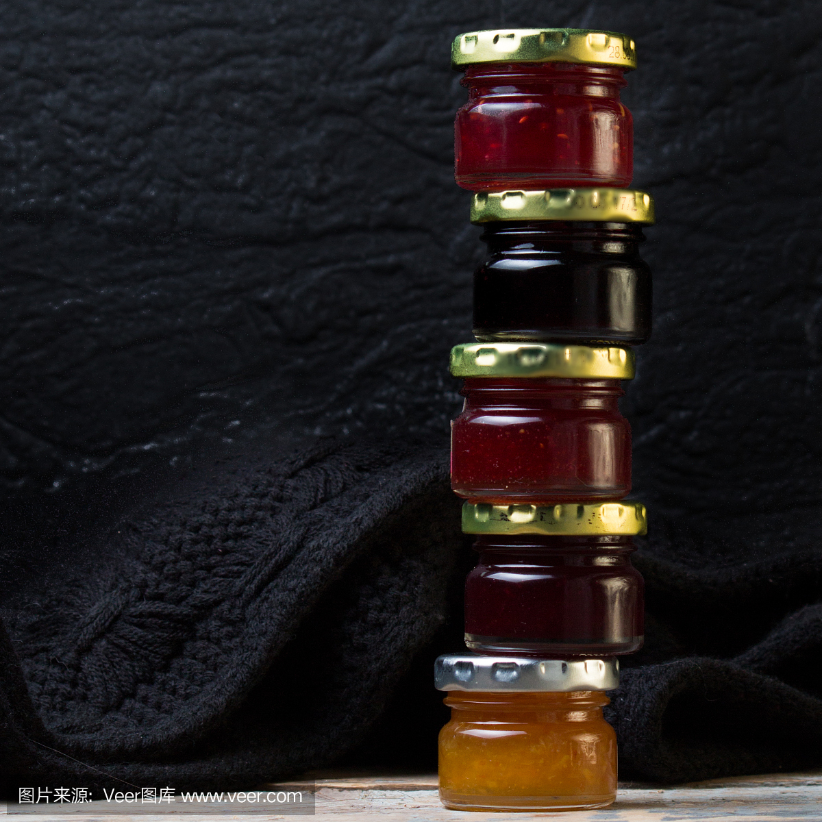 jam in small jars with different flavors