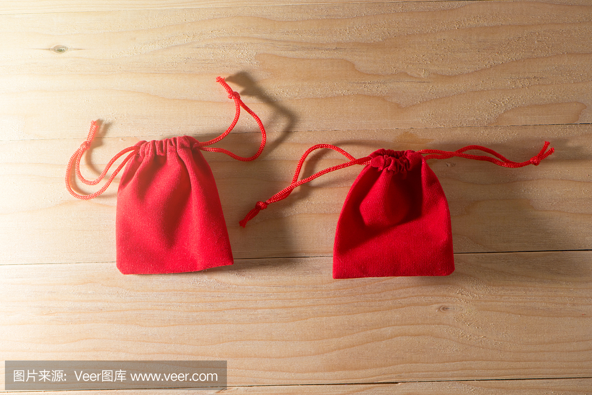 Red Gift Bag on Old Shabby Wooden Table co